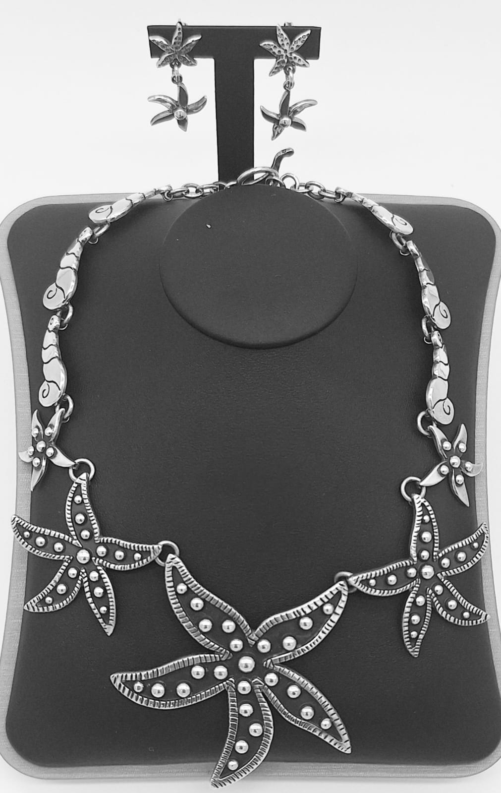 SET DE COLLAR Y ARETE, ESTRELLA DE MAR DE PLATA LEY 925.