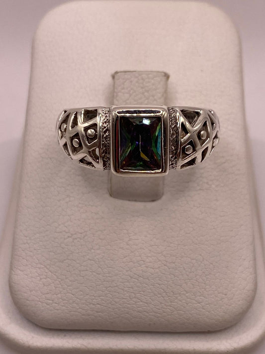 ANILLO ELEGANTE CON ZIRCONIA MULTICOLOR EN PLATA LEY 950, vista frontal