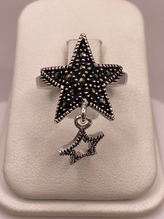 ANILLO ESTRELLA CON MARQUESITAS EN PLATA LEY 925, vista frontal