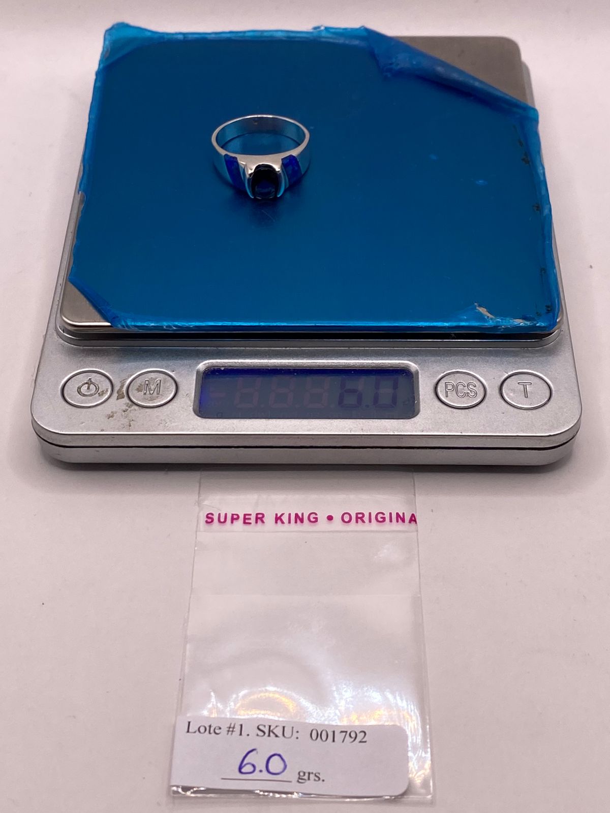 Anillo con Ópalo de Fuego y Zirconia Azul en Plata Ley .950