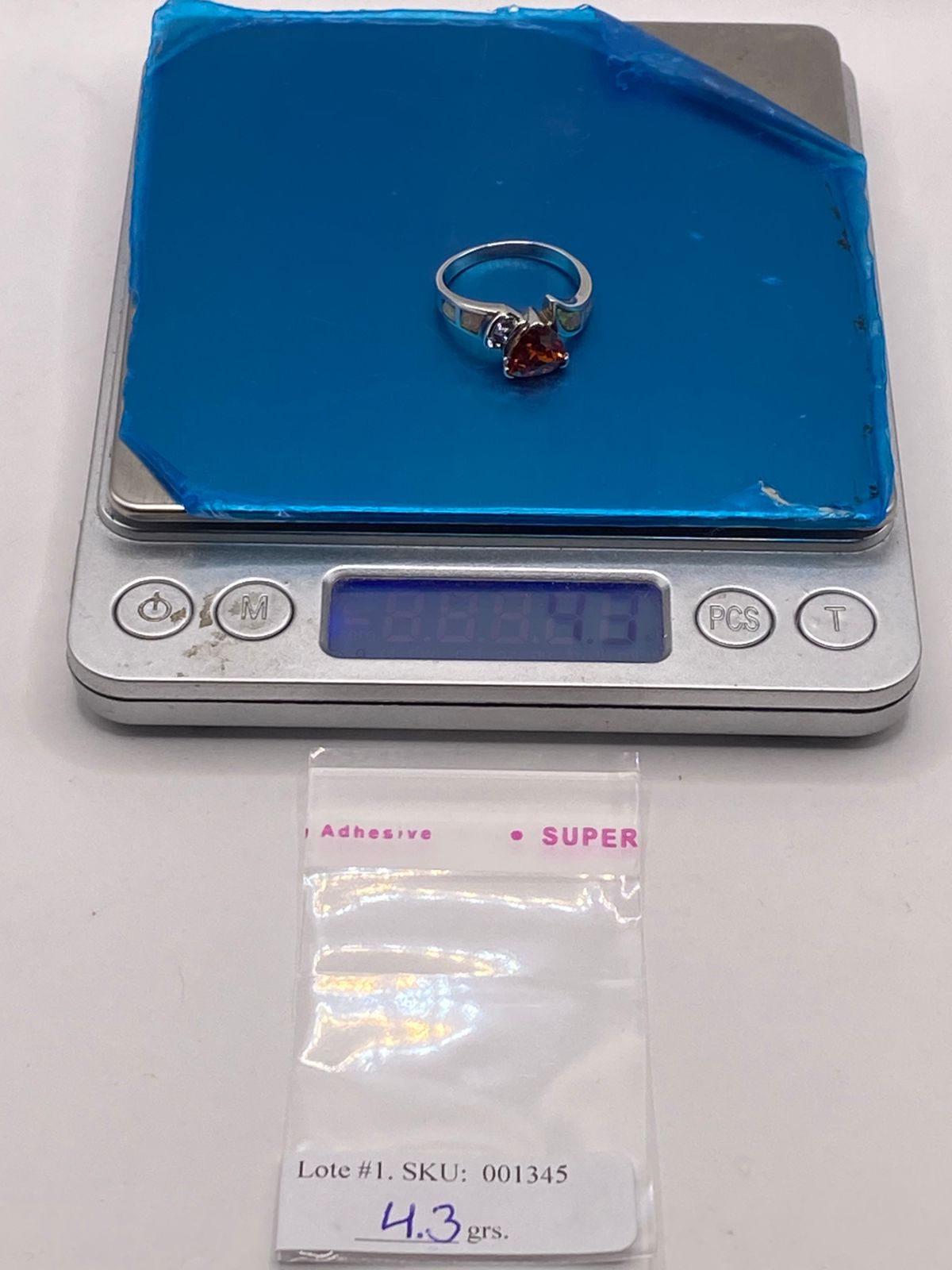 Anillo de Plata Ley 925 con Ópalo de Fuego, Zirconias y Piedra Central Naranja
