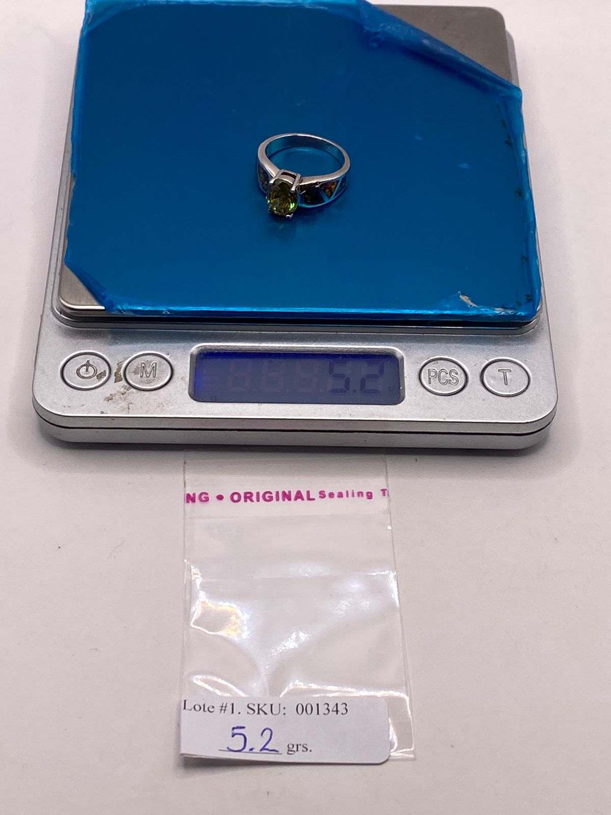 Anillo de Plata Ley 925 con Zirconia Amarilla y Ópalo de Fueg