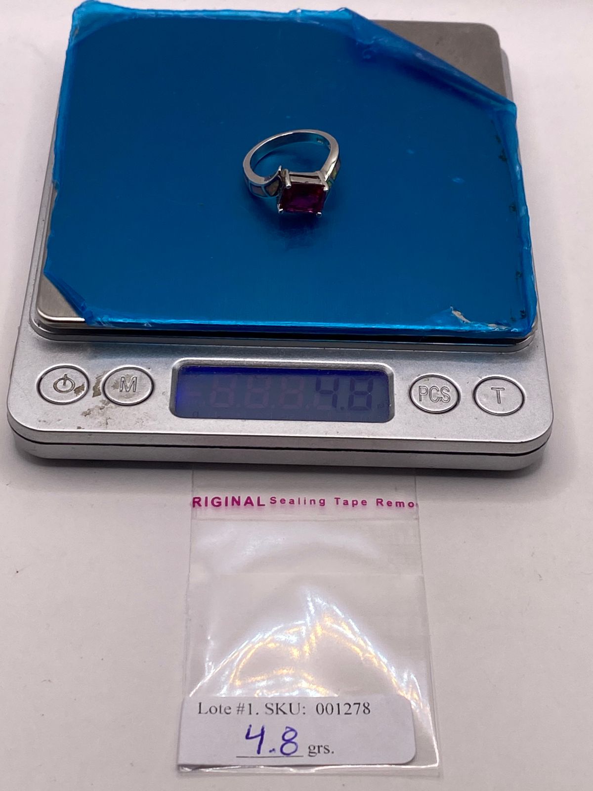 Anillo de Plata Ley 925 con Zirconia Fucsia y Ópalo de Fuego