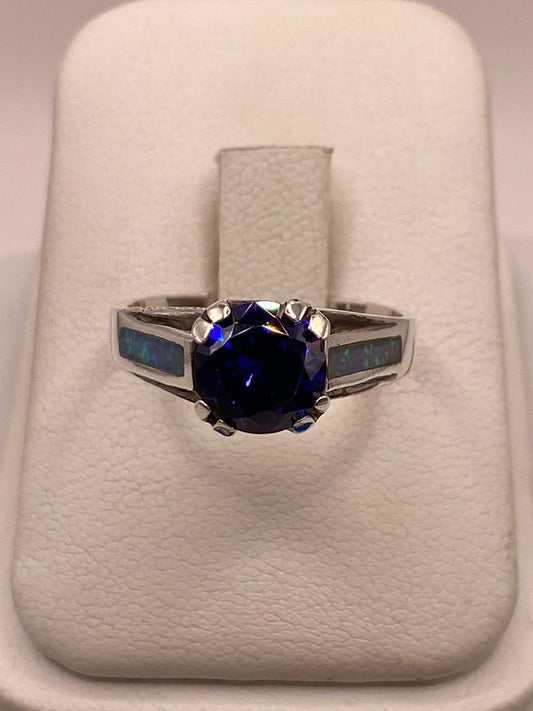 ANILLO DE PLATA .950 CON ZIRCONIA AZUL Y ÓPALO DE FUEGO DISEÑO SOLITARIO, vista frontal