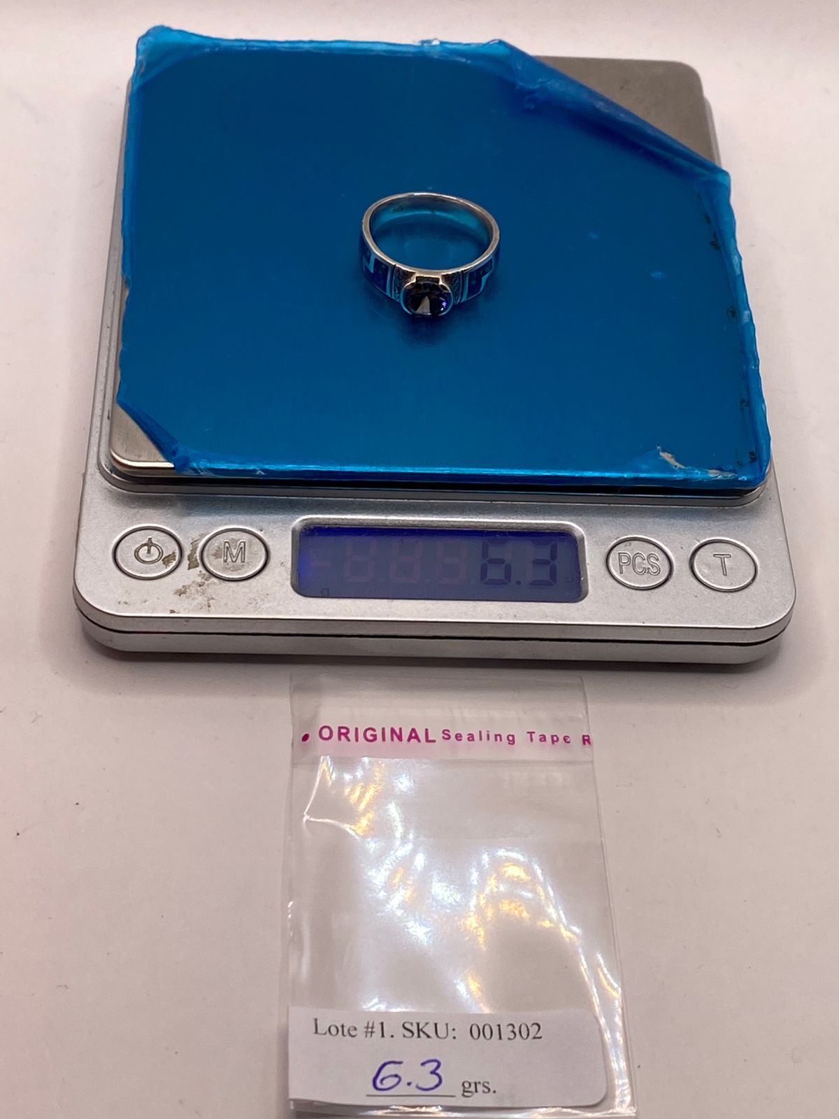 Anillo de Plata .950 con Ópalo de Fuego y Zirconia Multicolor Diseño Greca