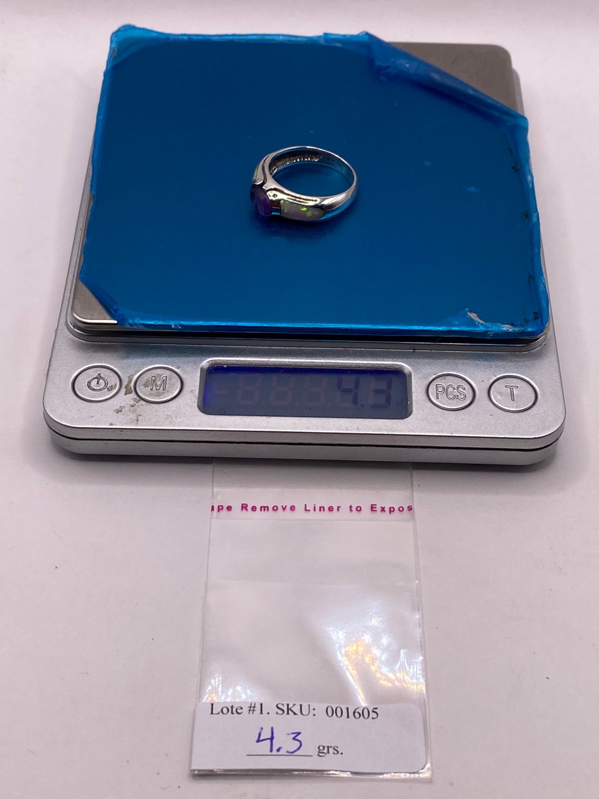 Anillo Solitario de Plata Ley 950 con Ópalo de Fuego y Zirconia