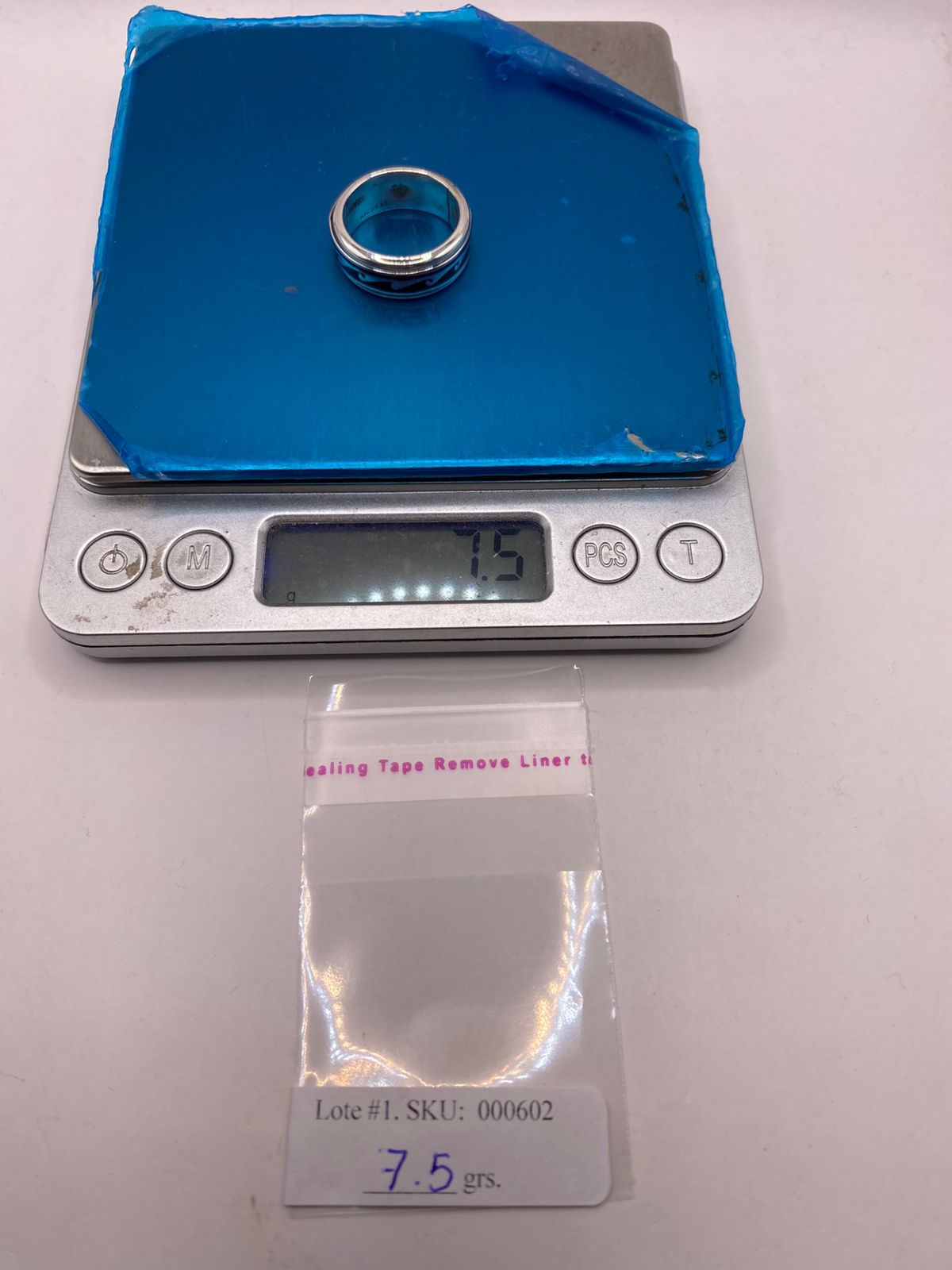 ANILLO SPINNER DE PLATA .925 CON DISEÑO DE OLAS