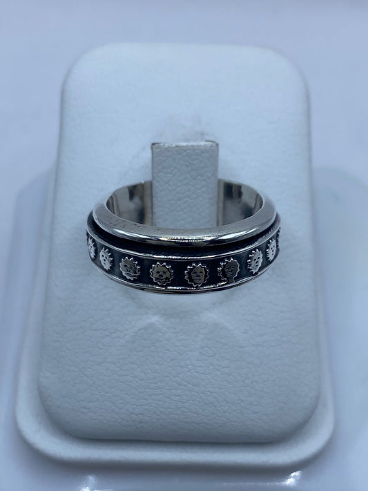 Anillo de plata .925 talla 7 con soles con rostro y mecanismo giratorio — joyería antiestrés prehispánica artesanal mexicana Taxco