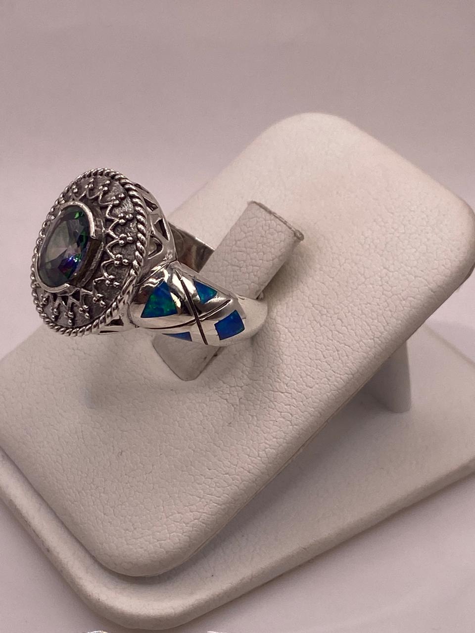 ANILLO ARTESANAL CON ÓPALO DE FUEGO, ZIRCONIA Y MARQUESITA EN PLATA LEY .950
