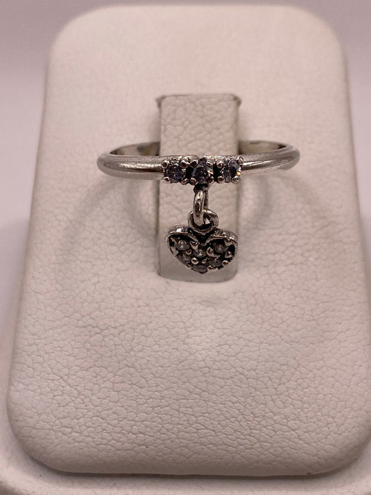 ANILLO DE CORAZÓN COLGANTE CON ZIRCONIAS BLANCAS EN PLATA LEY 925