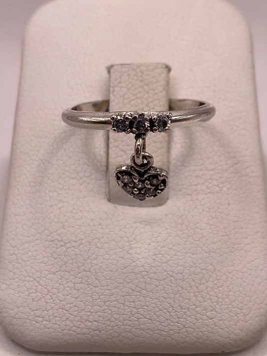 ANILLO DE CORAZÓN COLGANTE CON ZIRCONIAS BLANCAS EN PLATA LEY 925