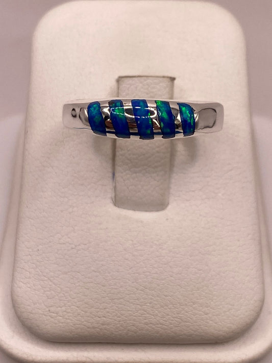 Anillo Delgado con Incrustaciones de Ópalo Azul y Verde en Plata Ley 950, vista frontal