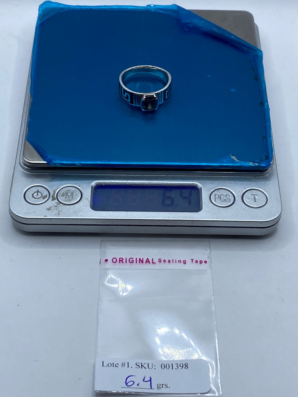 Anillo Greca de Plata .950 con Ópalo de Fuego y Zirconia Tornasol