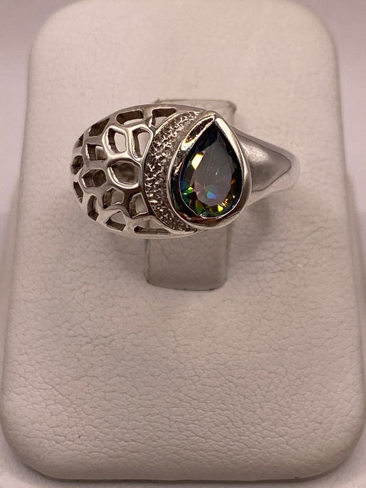 Anillo Moderno con Zirconia Iridiscente en Forma de Gota en Plata Ley 950, vista frontal