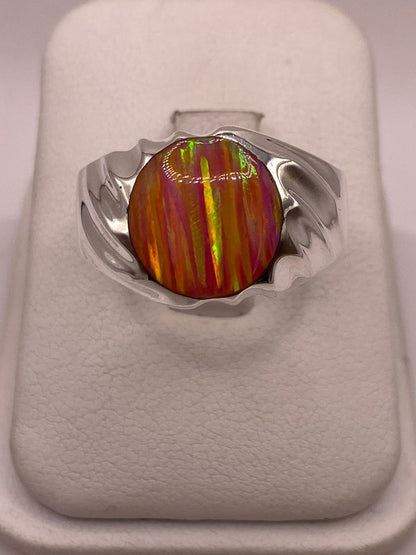 Anillo con Ópalo de Fuego Rosa Iridiscente en Plata Ley .950, vista frontal