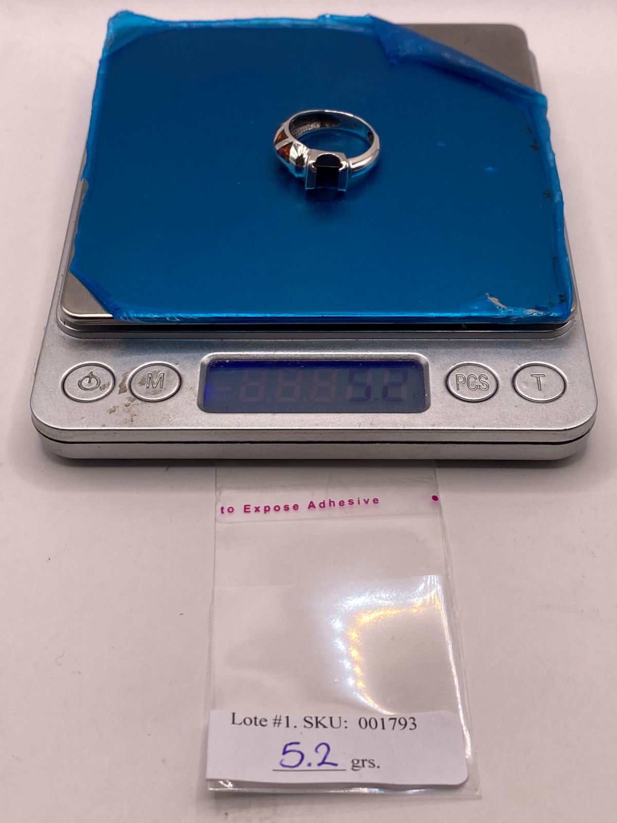 Anillo con Ópalo de Fuego y Zirconia Azul en Plata Ley .950