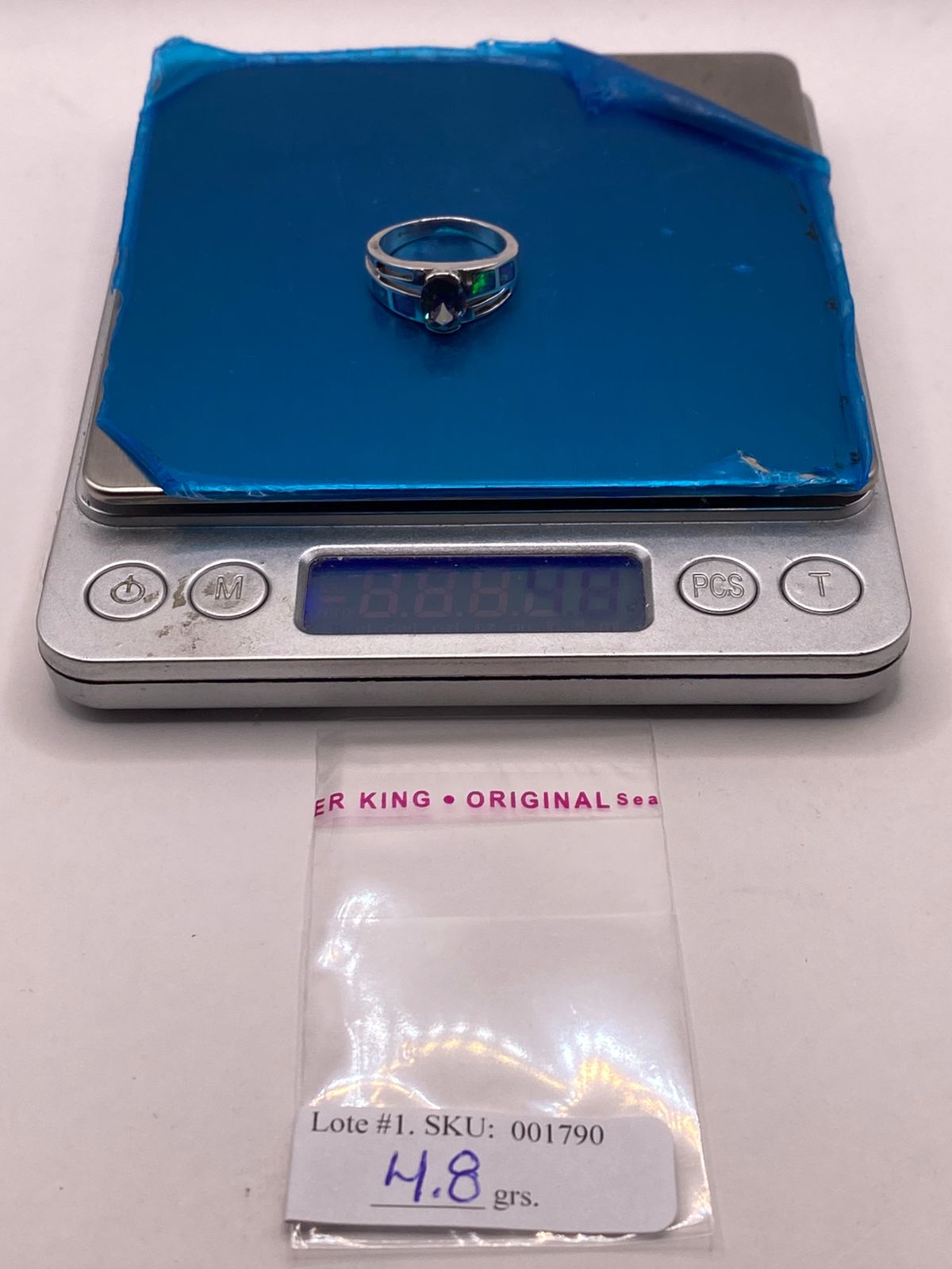 ANILLO CON ÓPALO DE FUEGO Y ZIRCONIA MULTICOLOR EN PLATA LEY .950
