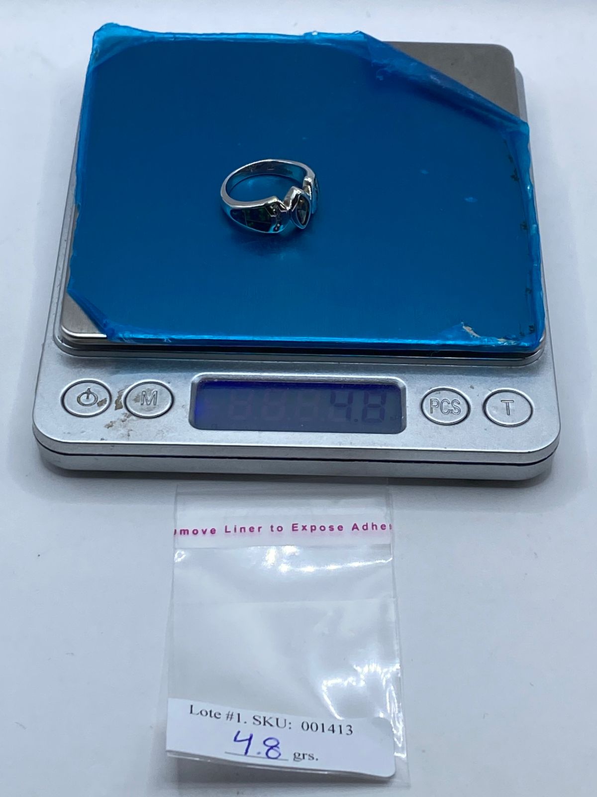 Anillo de Plata Ley 925 con Ópalo de Fuego Azul y Zirconia Verde Olivo