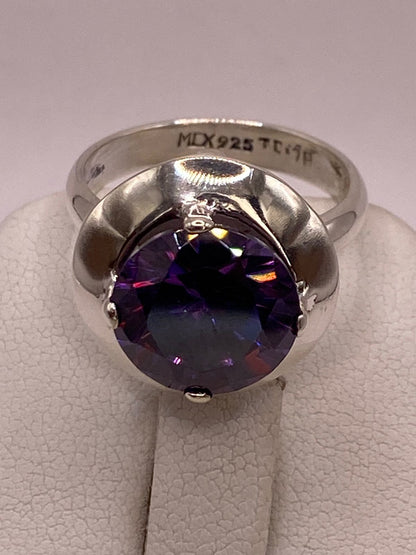 Anillo de Plata Ley 925 con Zirconia Violeta Redonda