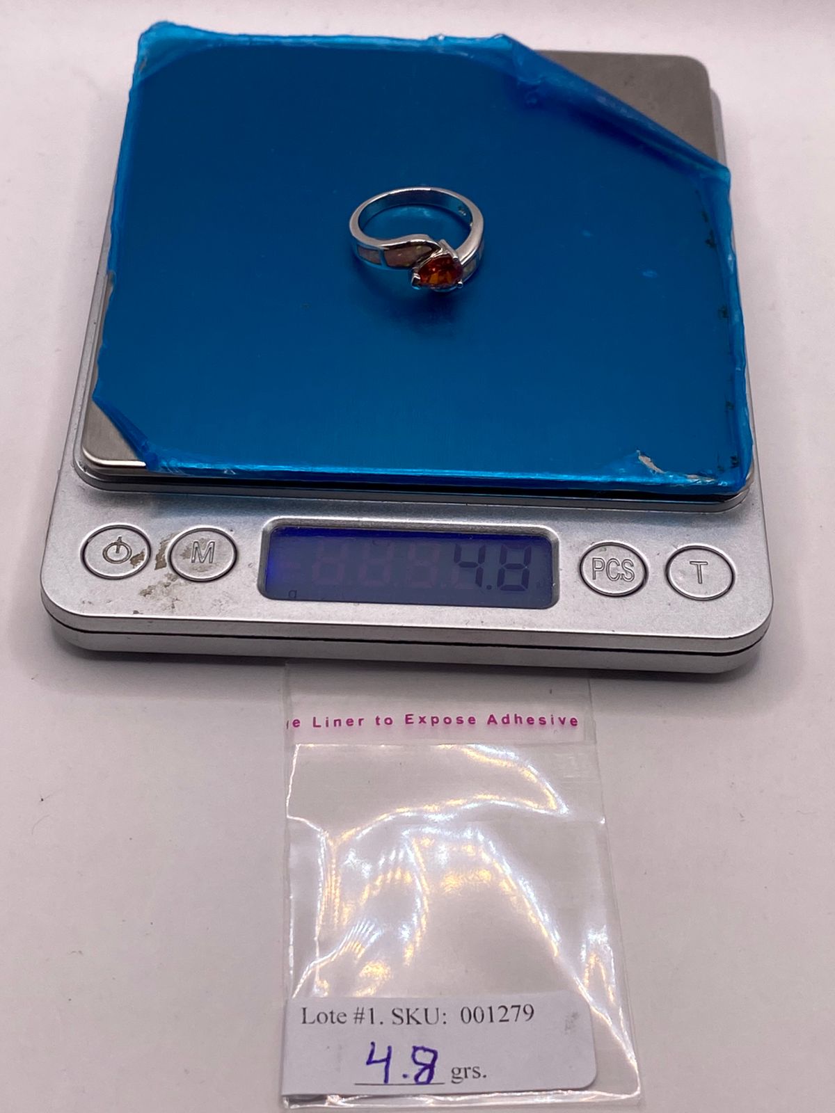 Anillo de Plata Ley 925 con Zirconia Naranja y Ópalo de Fuego
