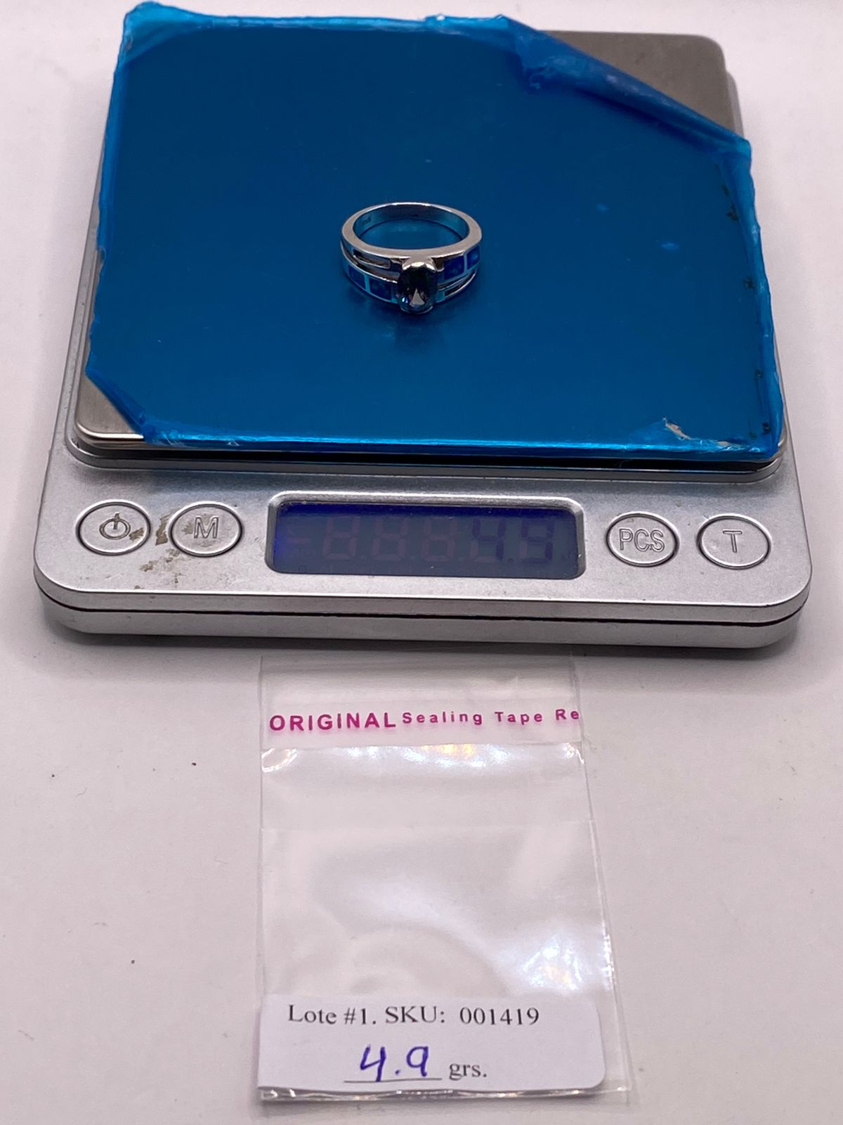 Anillo de Plata Ley 950 con Ópalo de Fuego y Zirconia Tornasol