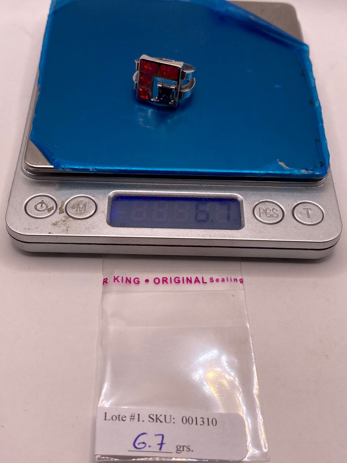 Anillo de Plata .950 con Ópalo de Fuego y Zirconia Azul Diseño Geométrico Moderno