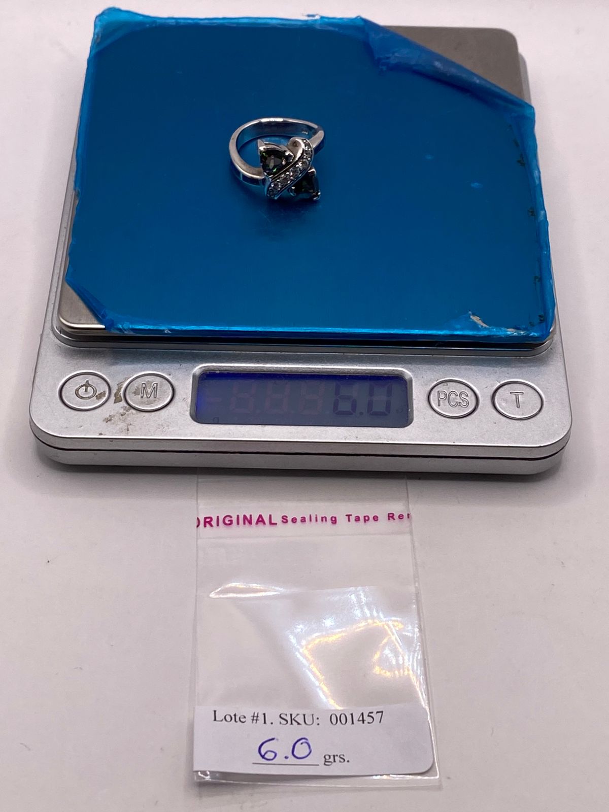 Anillo Solitario de Plata Ley 925 con Ópalo de Fuego y Zirconia