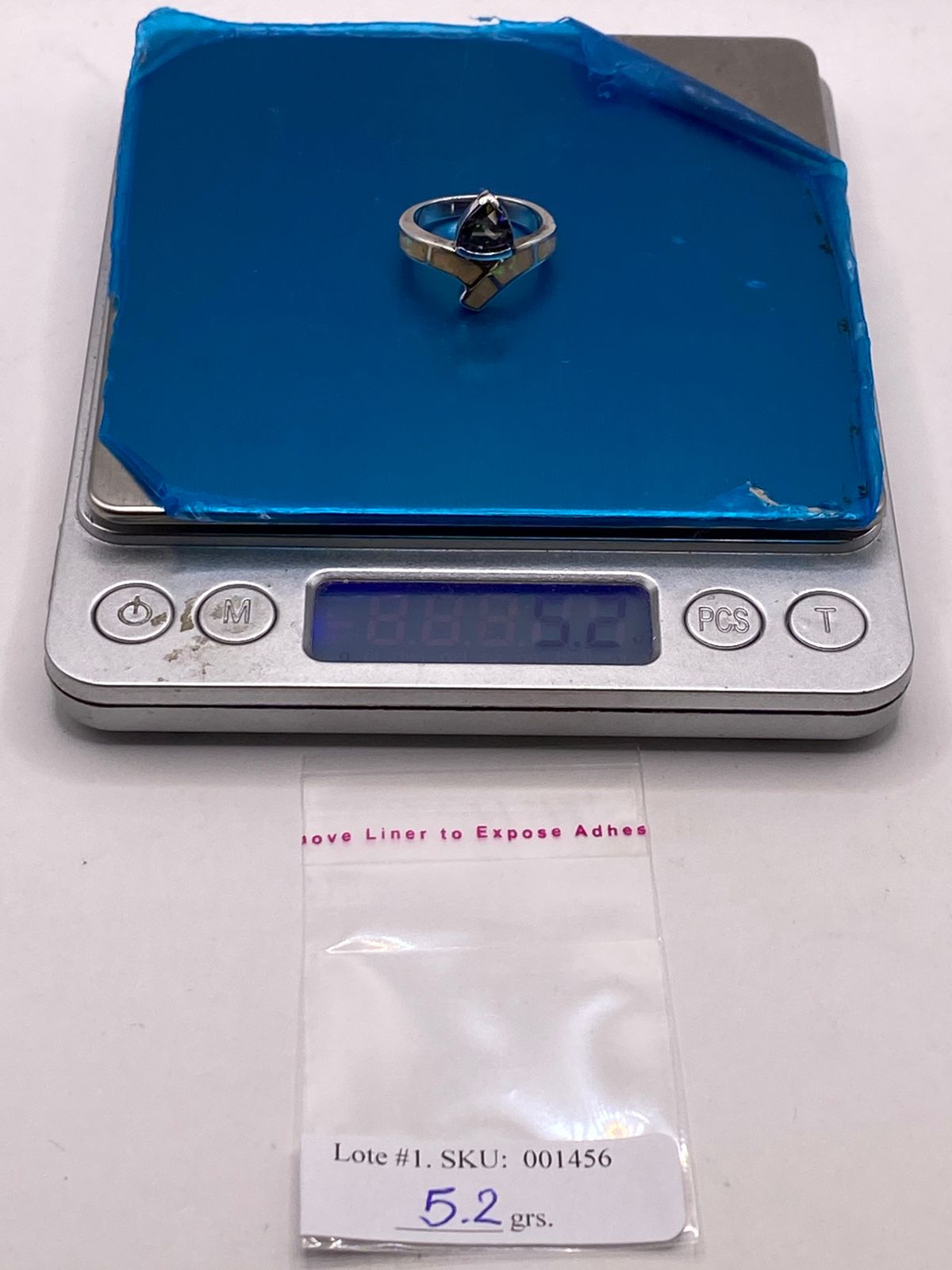 Anillo Solitario de Plata Ley 925 con Ópalo de Fuego y Zirconia Tornasol