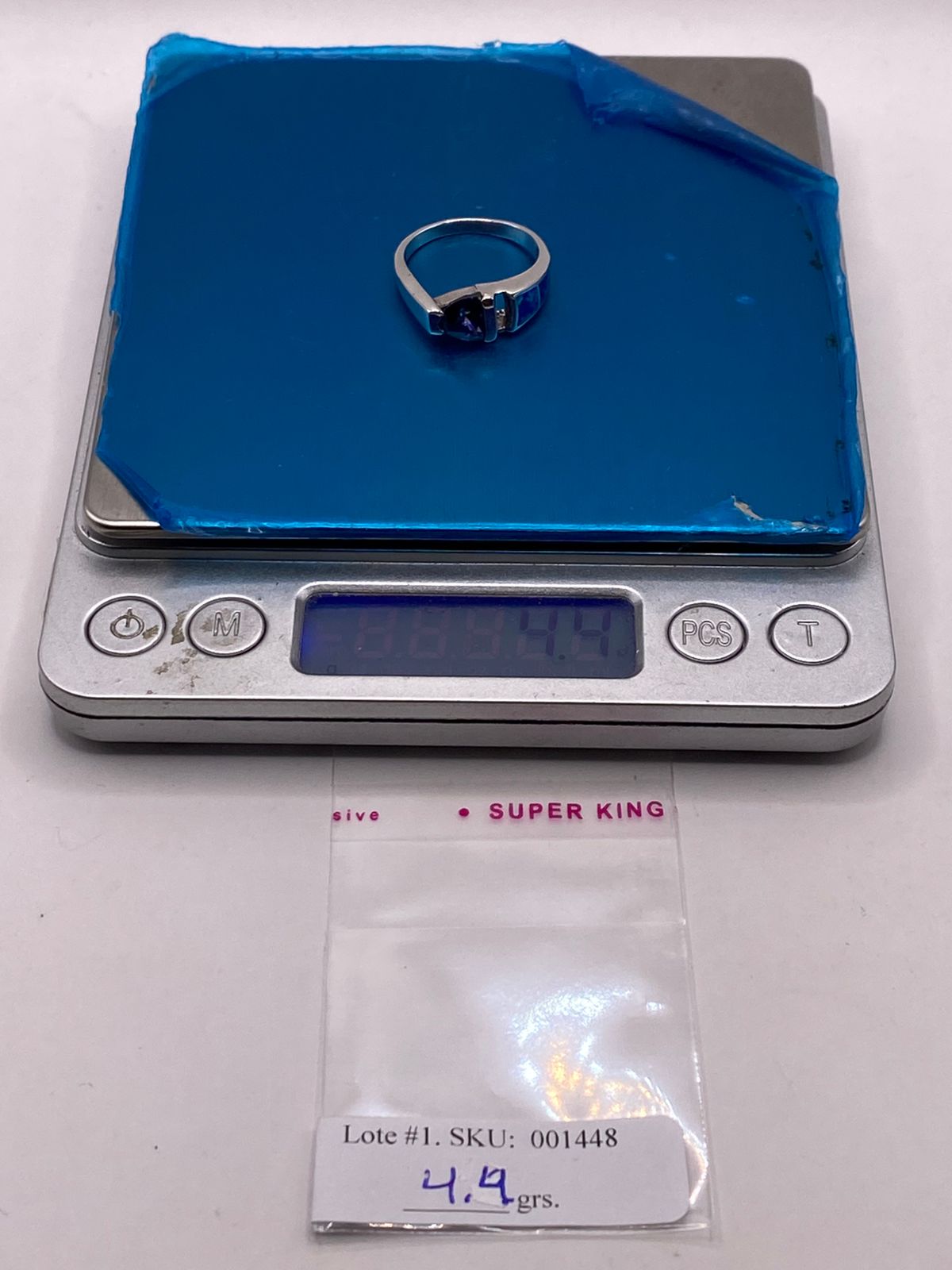 Anillo Solitario de Plata Ley 950 con Ópalo de Fuego y Zirconia Morada