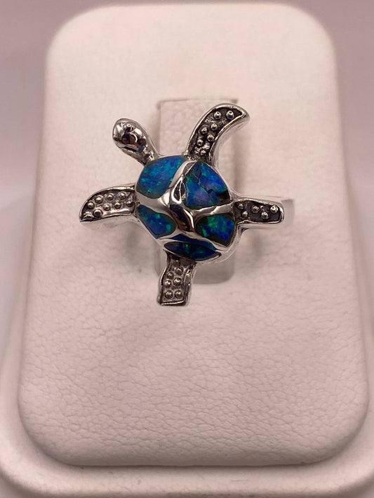 Anillo Tortuga Marina en Plata Ley 950 con Ópalo de Fuego🐢 en báscula mostrando peso