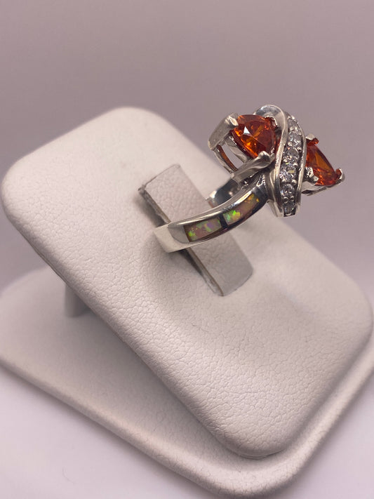 Vista frontal del anillo cocktail de plata .925 con piedra naranja fuego
