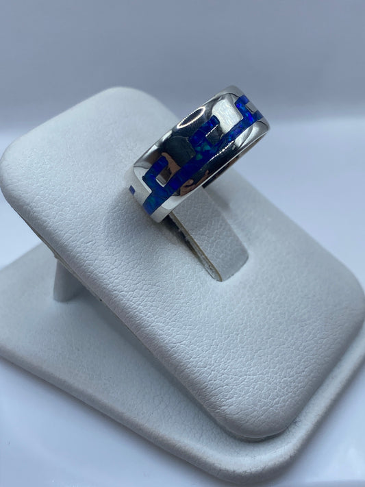 Ópalo de fuego azul engastado en plata .925, detalle del juego de colores