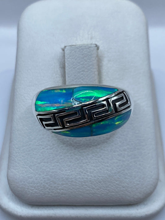 Anillo de plata .950 con ópalo de fuego azul cielo en caja de presentación