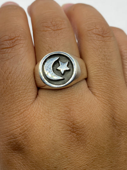 Anillo de sello plata .925 con hallmark visible, fondo blanco, diseño icónico mexicano