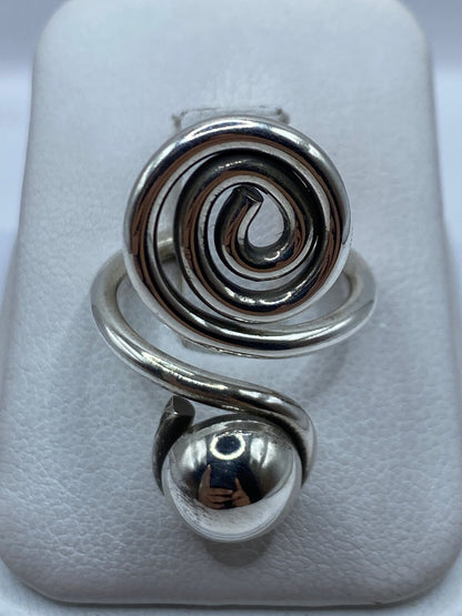 Anillo de plata .925 giratorio ajustable, vista frontal mostrando las dos bandas que rotan