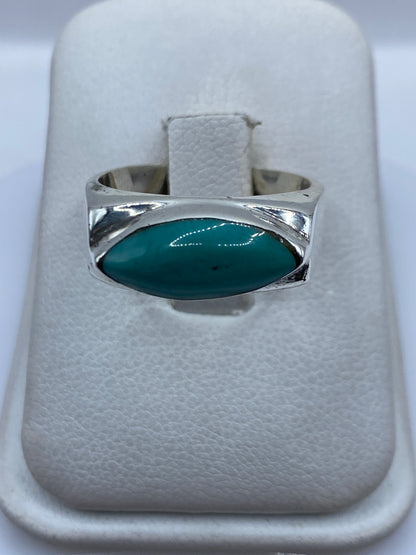 Anillo de plata .925 con turquesa azul cielo en caja blanca, vista superior