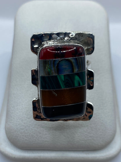Anillo ajustable de plata con cinco piedras multicolor engastadas a mano