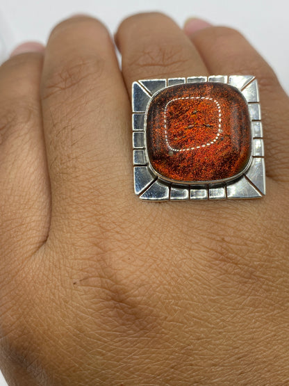 Anillo de diseño cuadrado con marco facetado en plata de Taxco