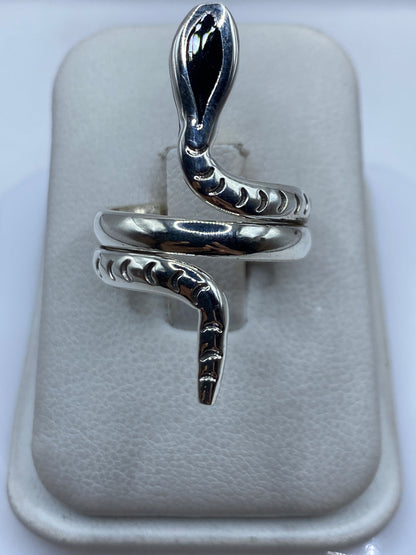 Anillo serpiente en plata .925 con cabezas envolventes, pulido espejo