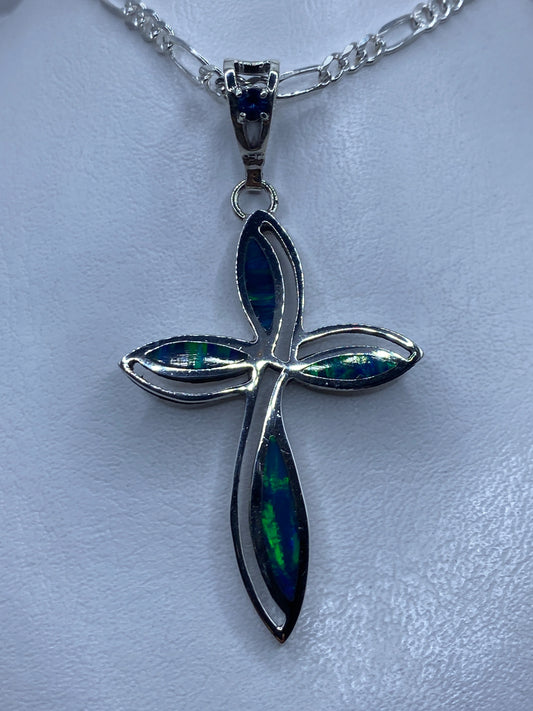 Dije cruz de plata con Opalo de Fuego azul engastado a mano