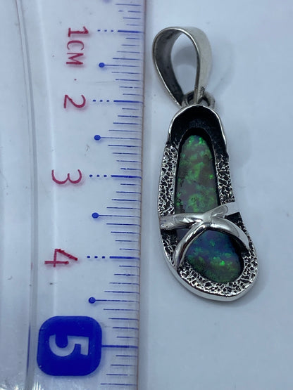 Marca de Quinto .950 en la clavícula del dije de plata pura