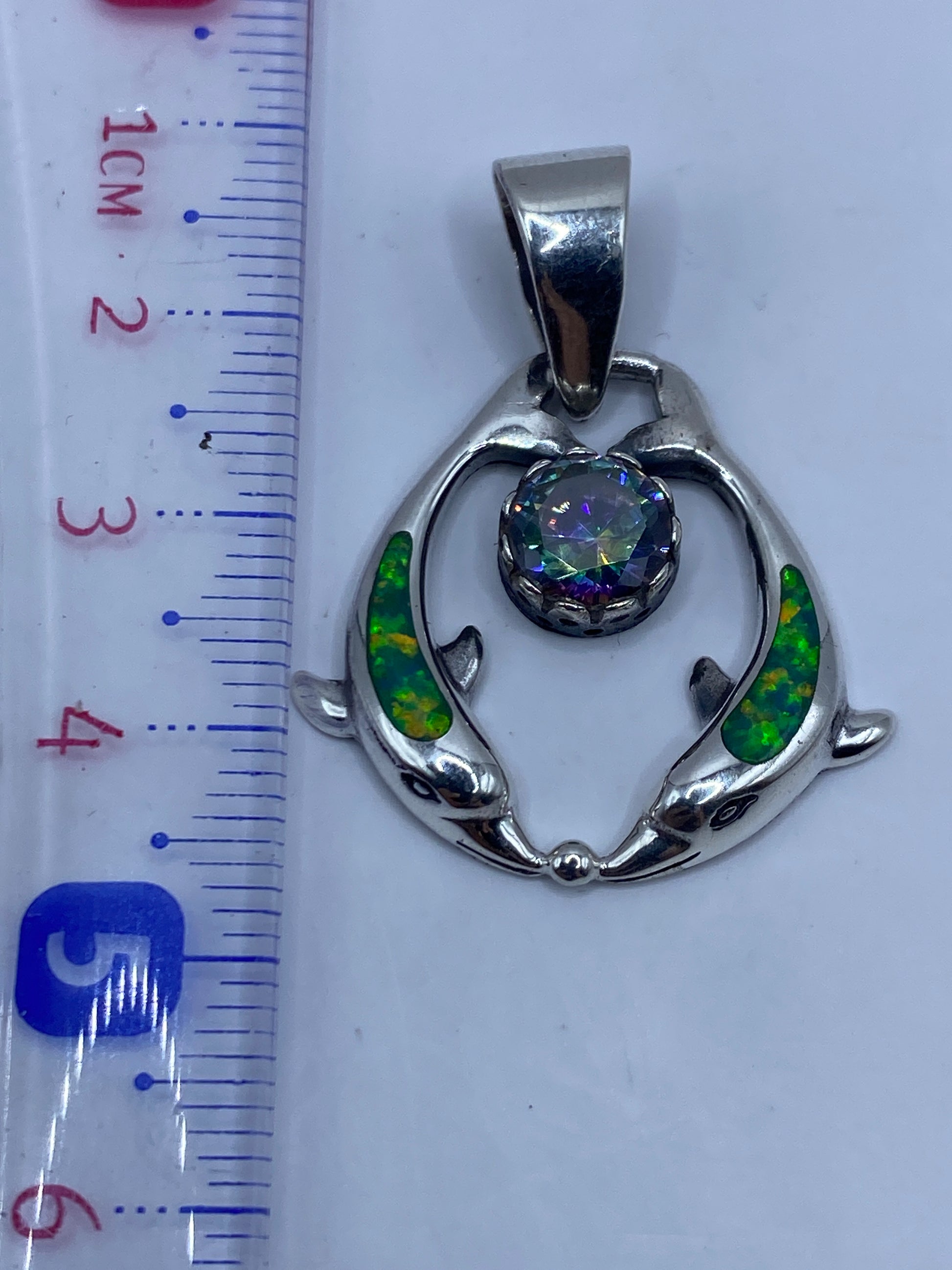 Dije en escala de peso: 5.3 gramos, plata .950 Taxco