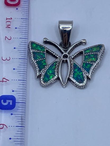 Dije mariposa 4.1 cm de largo en plata .950 con sello de autenticidad de Taxco