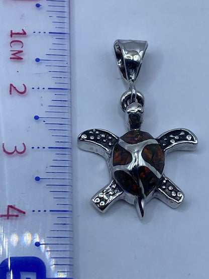 Dije con medida en regla — 3.8 cm de largo, sin cadena