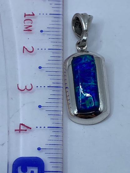 Reverso del dije mostrando el sello 925 y el acabado artesanal