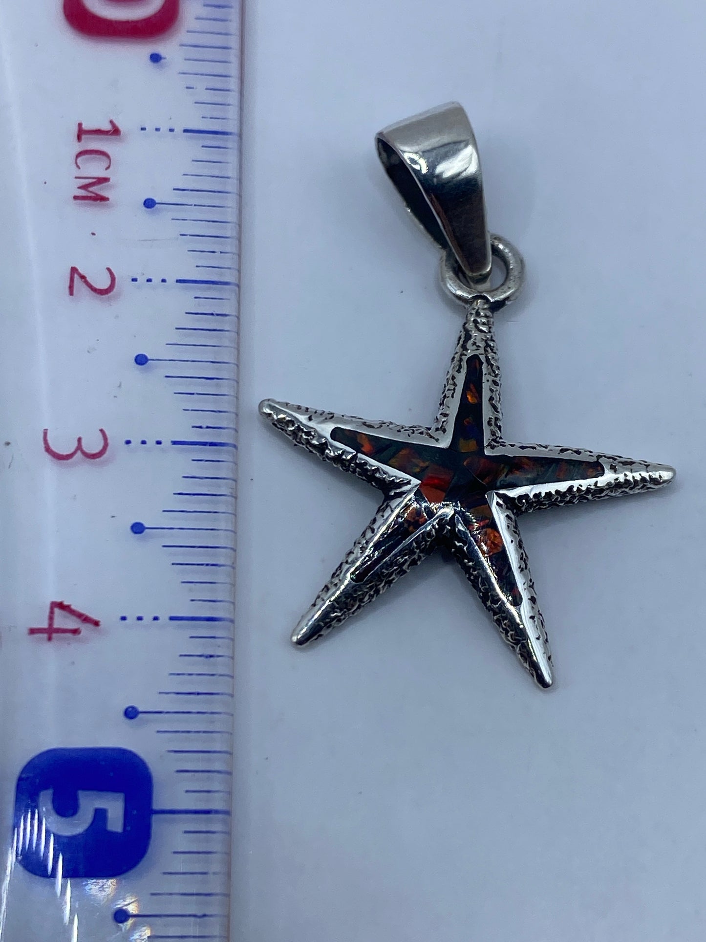 Detalle del Quinto .950 en la estrella de mar de Taxco
