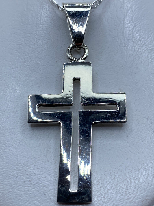 Dije de cruz de plata .925 en la mano, 6 cm de largo, Taxco