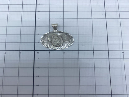 Dije pesado en báscula de precisión: 3.6 gramos de plata pura