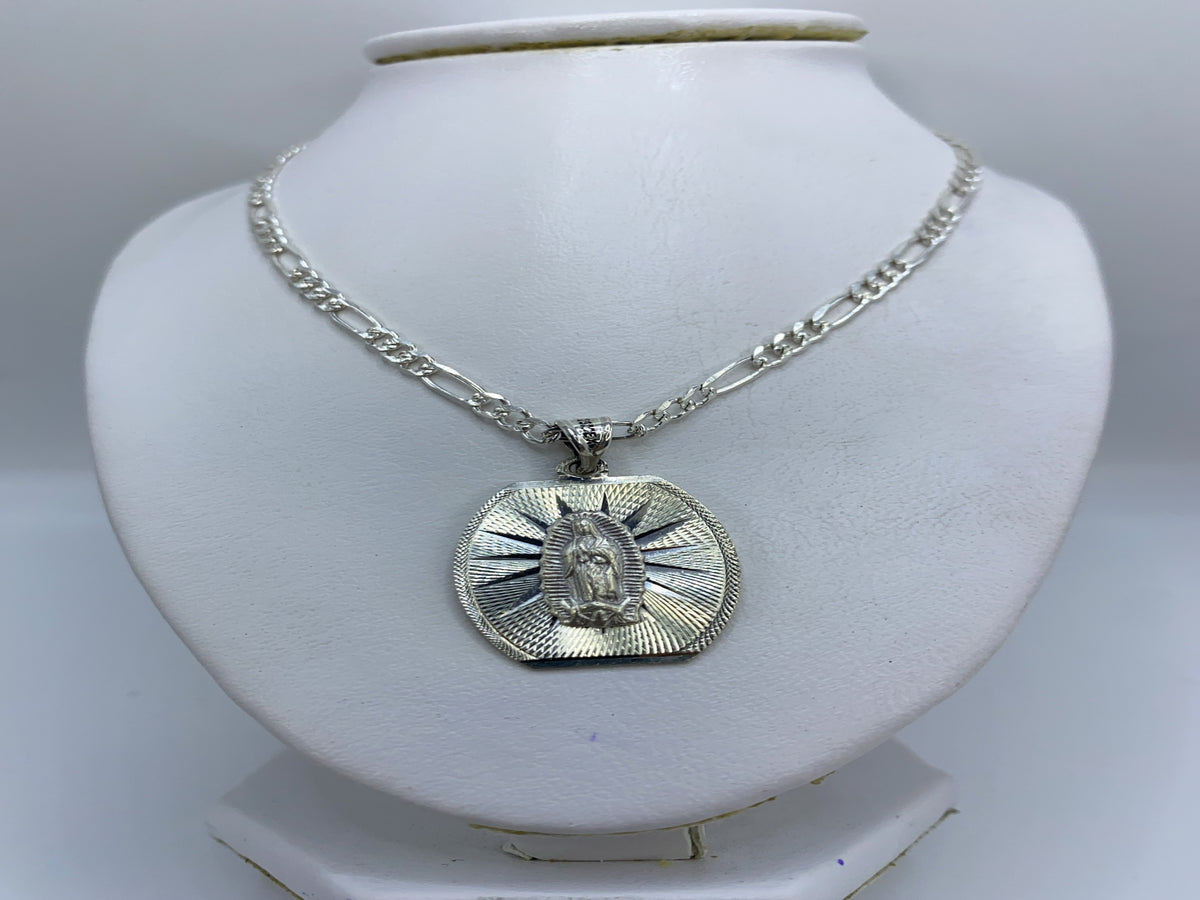 Dije de 3 cm de largo sobre medidor de centímetros, plata pura .925 de Taxco