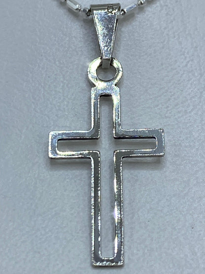Detalle del aro de la cruz para enganchar la cadena
